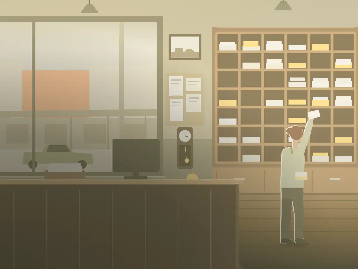 An office administrator files the morning mail into the pigeonholes behind the counter of a country stock and station agency.