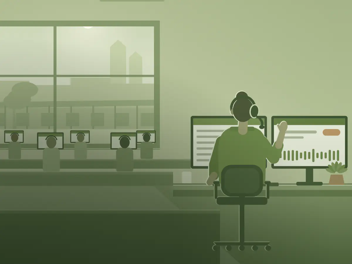 A customer service agent on her headset lifts a hand as she explains a call, rows of colleagues at their screens beside her.